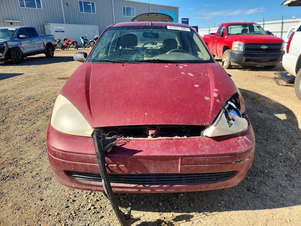 Photo 5 from auction – 2000 FORD FOCUS with VIN 1FAFP3836YW179097
