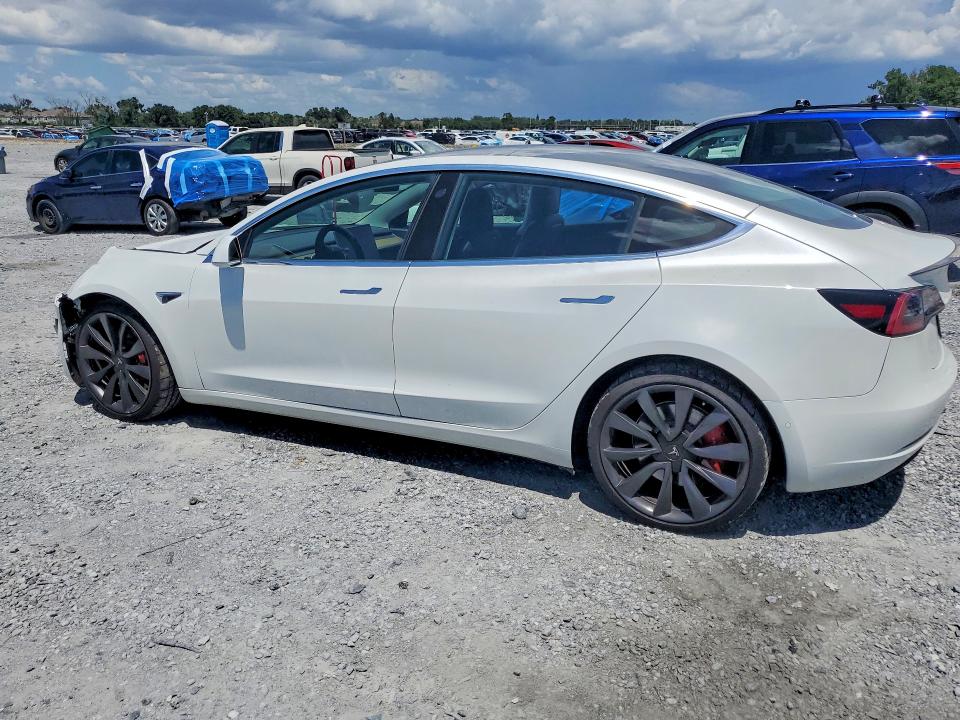 Photo 2 from auction – 2020 TESLA MODEL 3 with VIN 5YJ3E1EC5LF714235