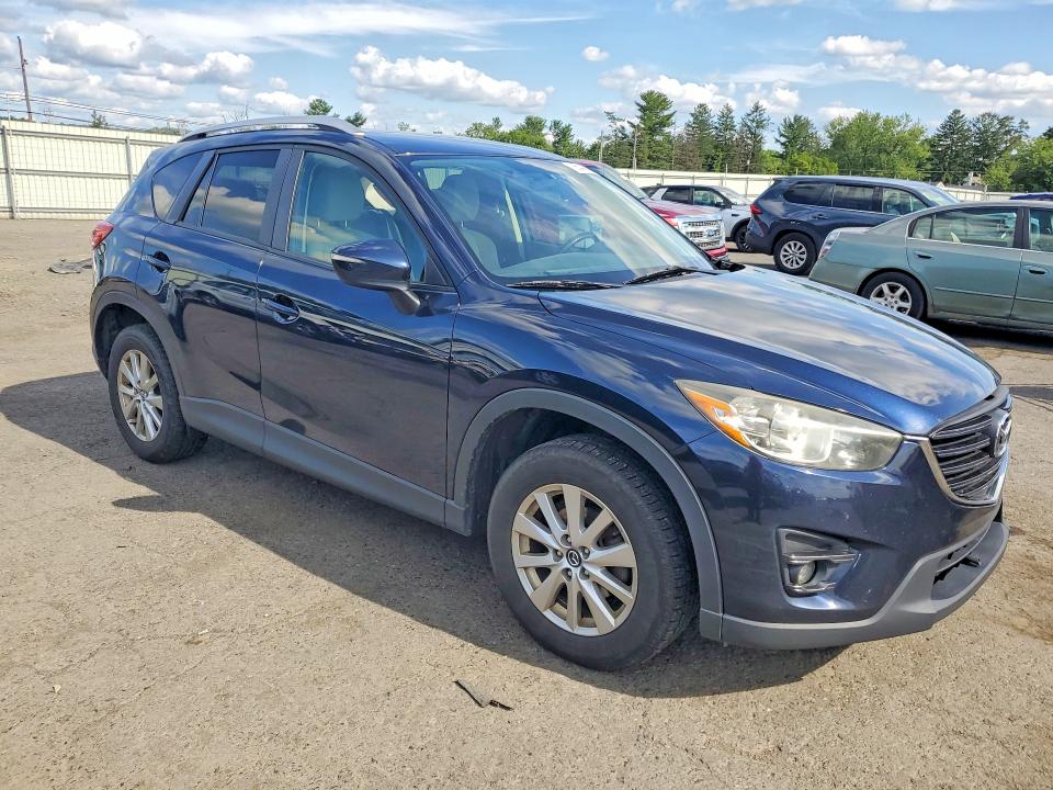 Photo 4 from auction – 2016 MAZDA CX-5 with VIN JM3KE4CY3G0797963