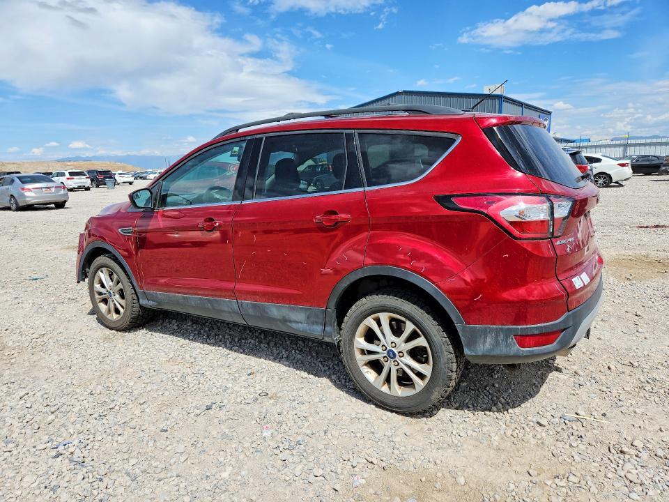 Photo 2 from auction – 2018 FORD ESCAPE with VIN 1FMCU9GD8JUB23565