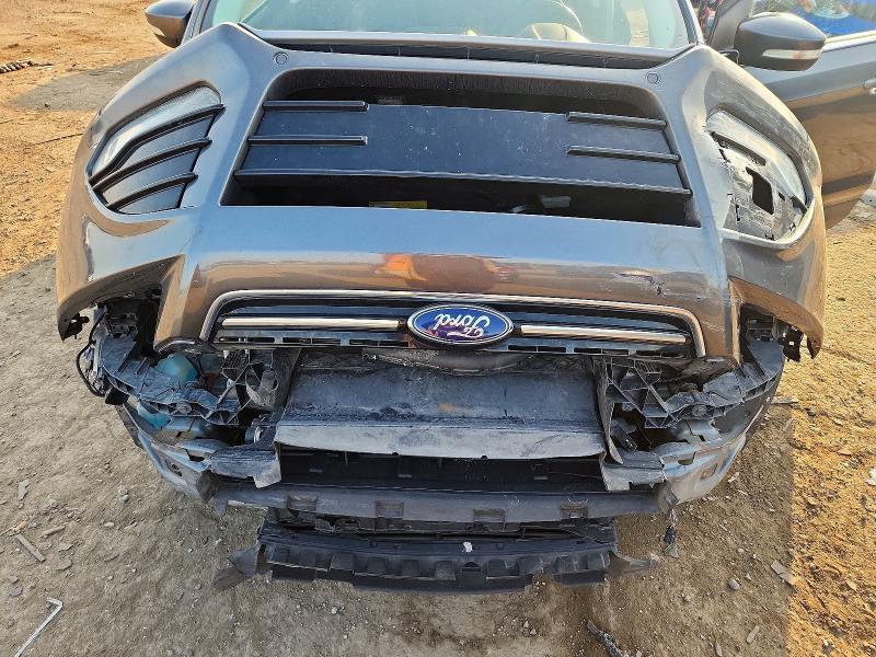 Photo 12 from auction – 2016 FORD ESCAPE with VIN 1FMCU0JX2GUC24432