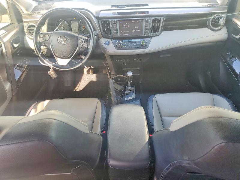 Photo 8 from auction – 2018 TOYOTA RAV4 HV with VIN JTMDJREV8JD182578