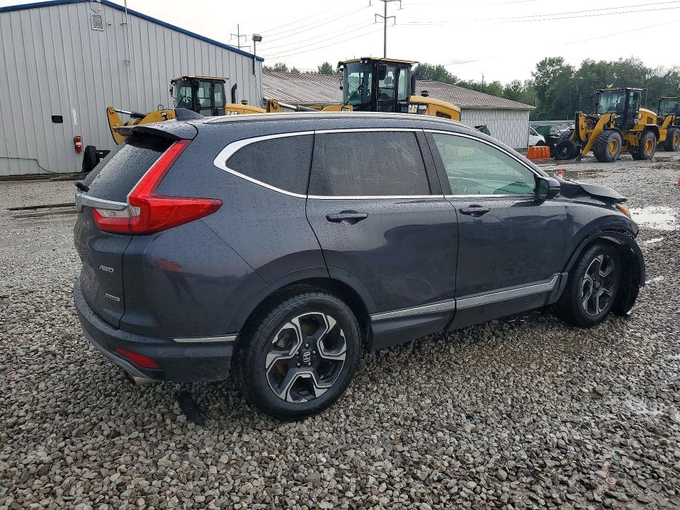 Photo 3 from auction – 2018 HONDA CR-V with VIN 7FARW2H93JE092474
