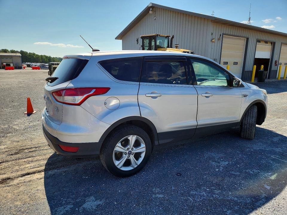 Photo 3 from auction – 2016 FORD ESCAPE with VIN 1FMCU9GX9GUC74403