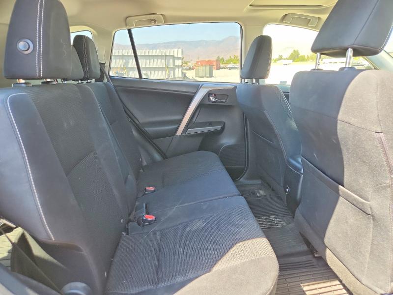 Photo 11 from auction – 2018 TOYOTA RAV4 with VIN JTMWFREV0JJ173899