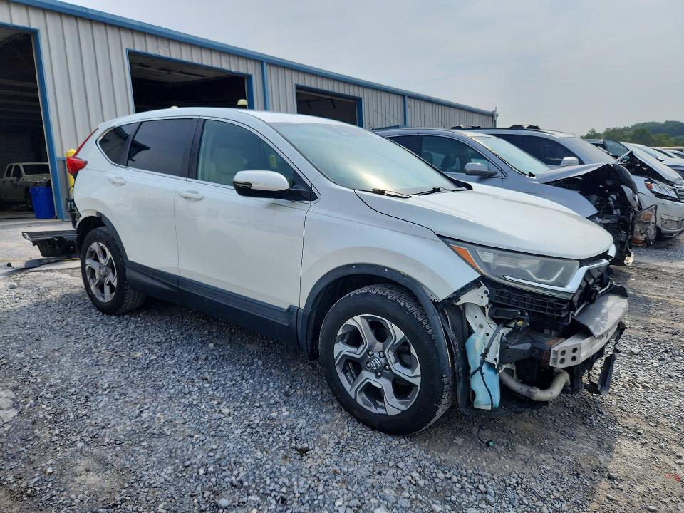 Photo 4 from auction – 2017 HONDA CR-V with VIN 2HKRW2H83HH611084
