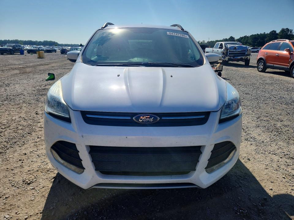 Photo 5 from auction – 2016 FORD ESCAPE with VIN 1FMCU9GX8GUA90893