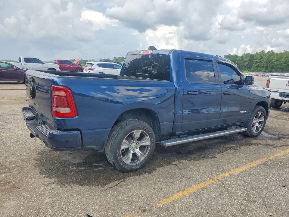 Photo 3 from auction – 2023 RAM 1500 with VIN 1C6RREJT0PN670445