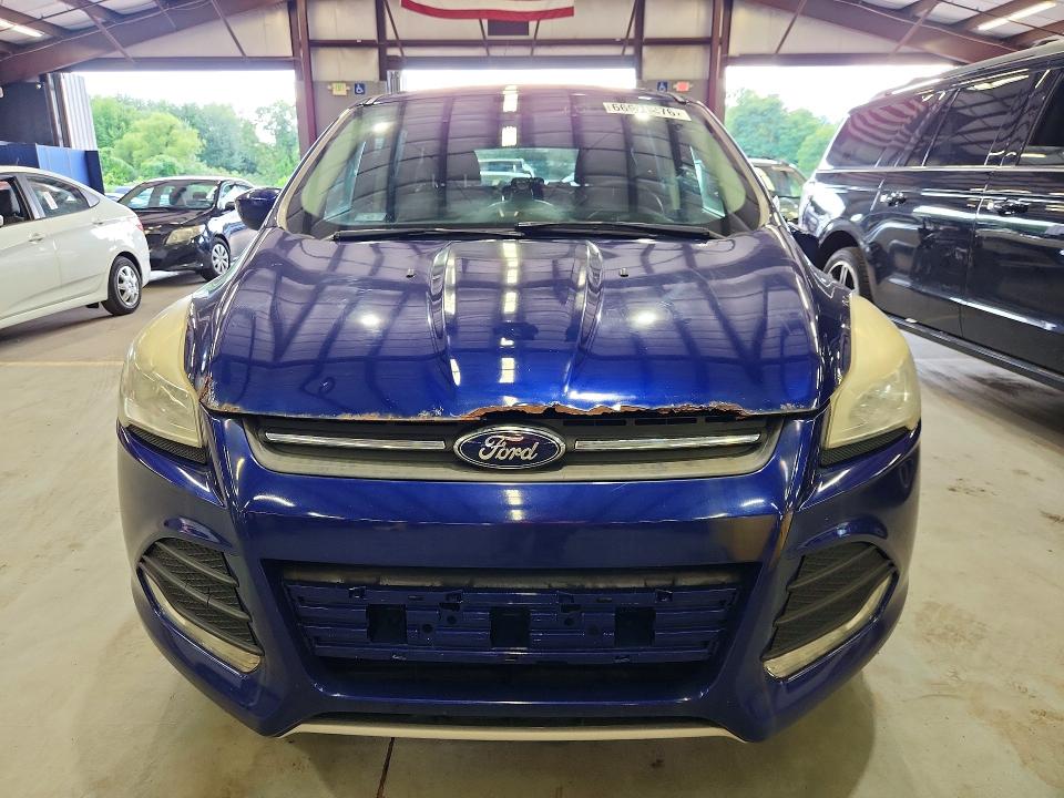 Photo 5 from auction – 2015 FORD ESCAPE with VIN 1FMCU9GX4FUC58706