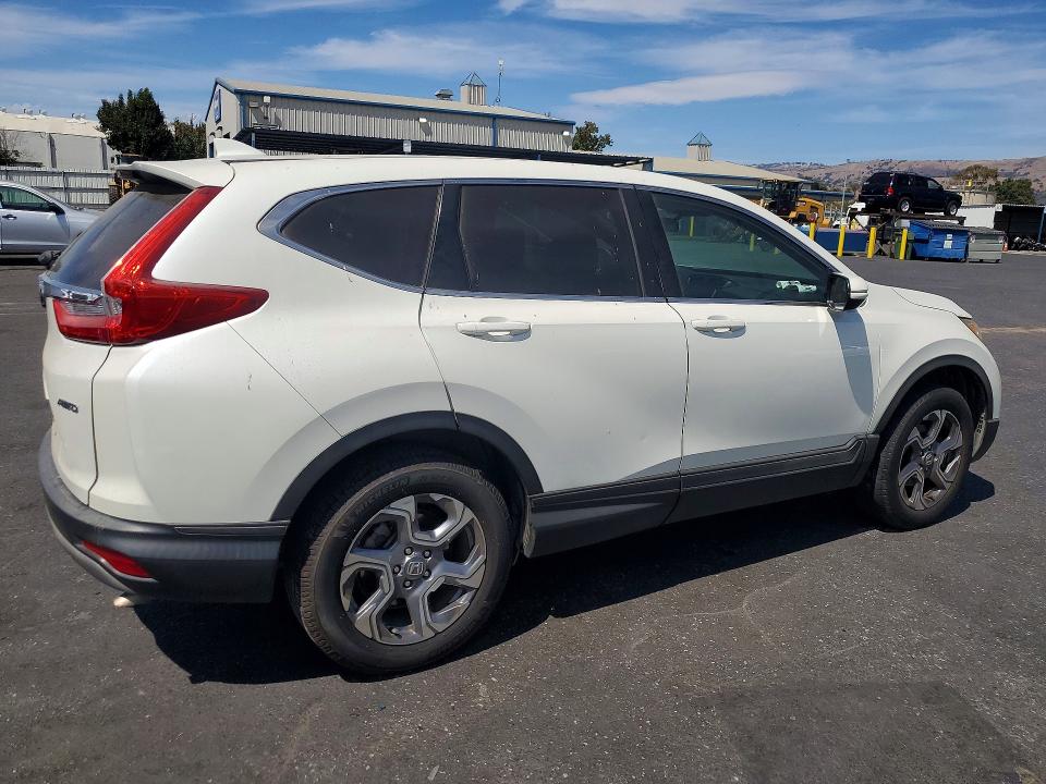 Photo 3 from auction – 2018 HONDA CR-V with VIN 2HKRW2H56JH637464
