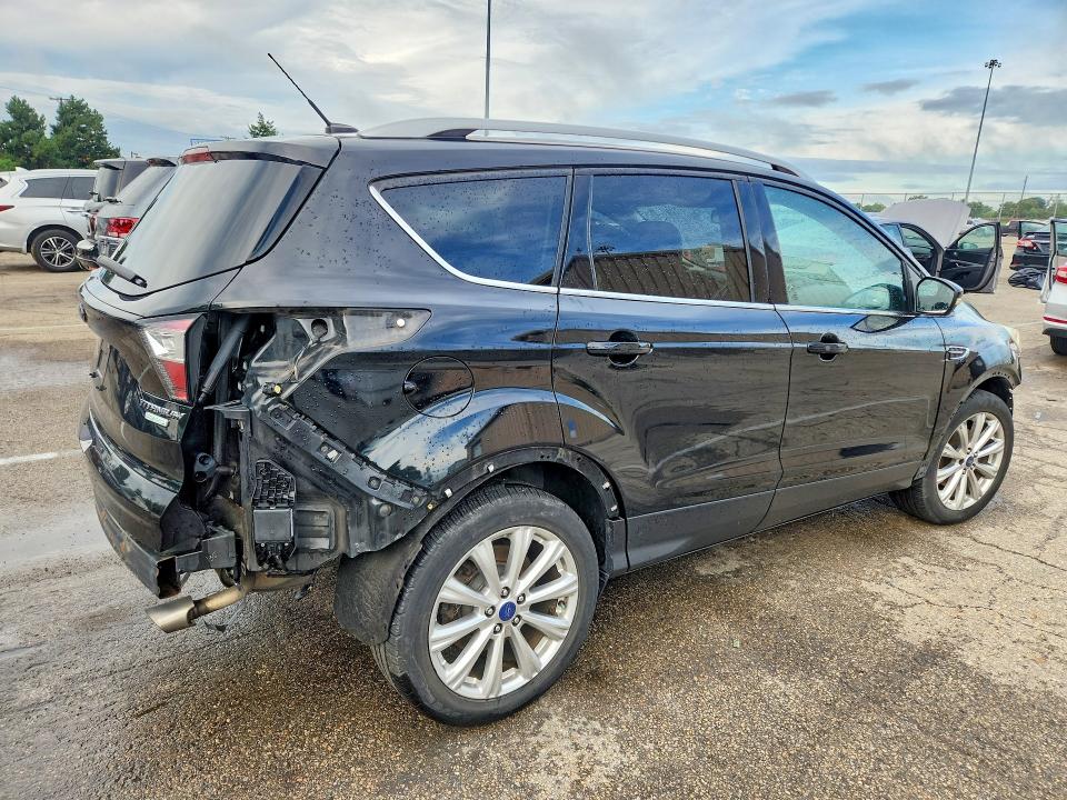 Photo 3 from auction – 2017 FORD ESCAPE with VIN 1FMCU0JD4HUC85286