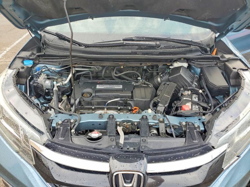 Photo 12 from auction – 2015 HONDA CR-V with VIN 5J6RM4H72FL034298