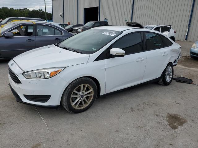 FORD FOCUS SE 2017 with VIN 1FADP3F27HL230027 - Photo from auction