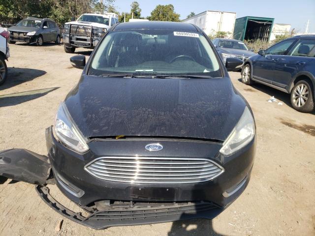 Photo 5 from auction – 2015 FORD FOCUS TITA with VIN 1FADP3N22FL253147