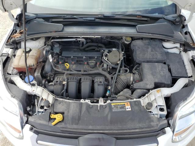 Photo 11 from auction – 2013 FORD FOCUS SE with VIN 1FADP3F23DL360798