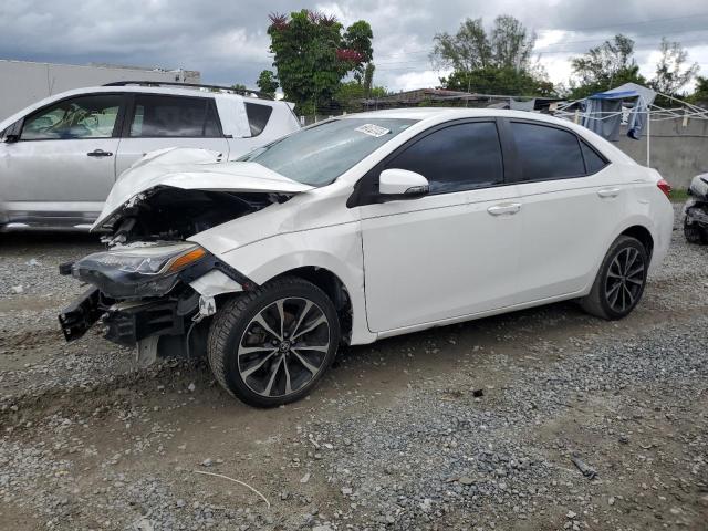 TOYOTA COROLLA L 2018 with VIN 5YFBURHE8JP808380 - Photo from auction