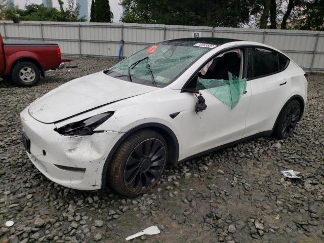 TESLA MODEL Y 2022 with VIN 7SAYGDEF3NF312585 - Photo from auction