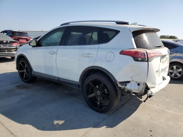 Photo 2 from auction – 2016 TOYOTA RAV4 XLE with VIN JTMWFREV5GJ076271