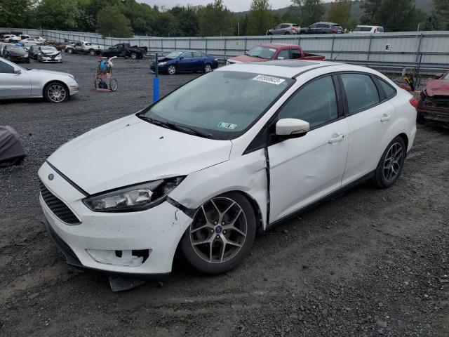 FORD FOCUS 2017 with VIN 1FADP3H27HL323028 - Photo from auction