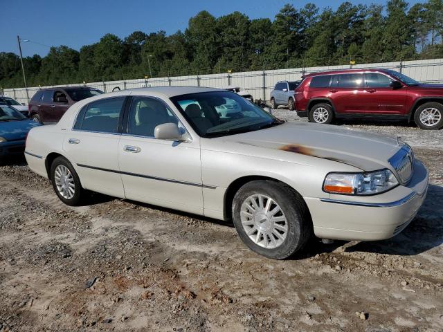 Photo 4 from auction – 2004 LINCOLN TOWN CAR E with VIN 1LNHM81W64Y677890