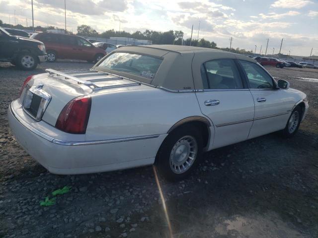 Photo 3 from auction – 2002 LINCOLN TOWN CAR E with VIN 1LNHM81W22Y603539