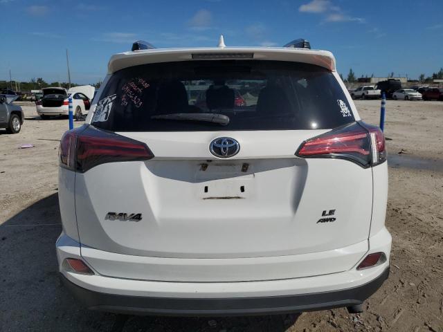 Foto 6 de la subasta – 2017 TOYOTA RAV4 LE con VIN 2T3BFREV3HW643370