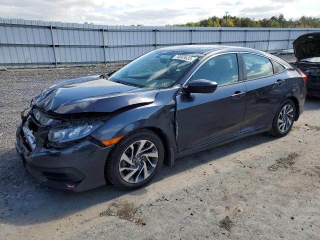 HONDA CIVIC EX 2018 with VIN 2HGFC2F76JH538928 - Photo from auction