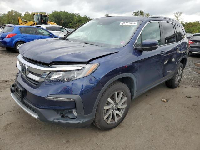 HONDA PILOT EXL 2021 with VIN 5FNYF6H57MB008060 - Photo from auction