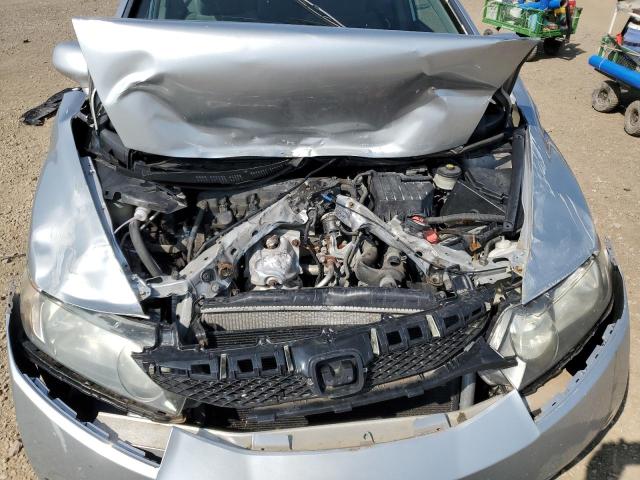 Photo 11 from auction – 2011 HONDA CIVIC LX with VIN 19XFA1F52BE034483