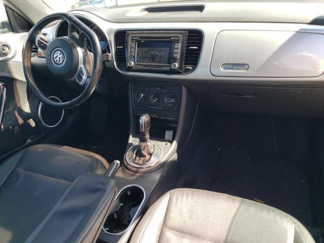 Photo 8 from auction – 2014 VOLKSWAGEN BEETLE with VIN 3VWJP7AT2EM628189