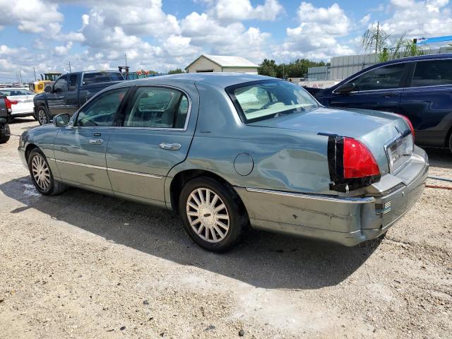 Photo 2 from auction – 2004 LINCOLN TOWN CAR E with VIN 1LNHM81W94Y688737