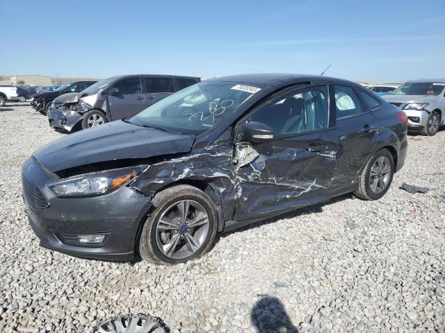 FORD FOCUS SE 2018 with VIN 1FADP3F28JL230317 - Photo from auction