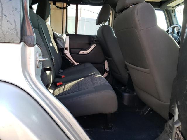 Photo 10 from auction – 2011 JEEP WRANGLER U with VIN 1J4BA5H18BL633860