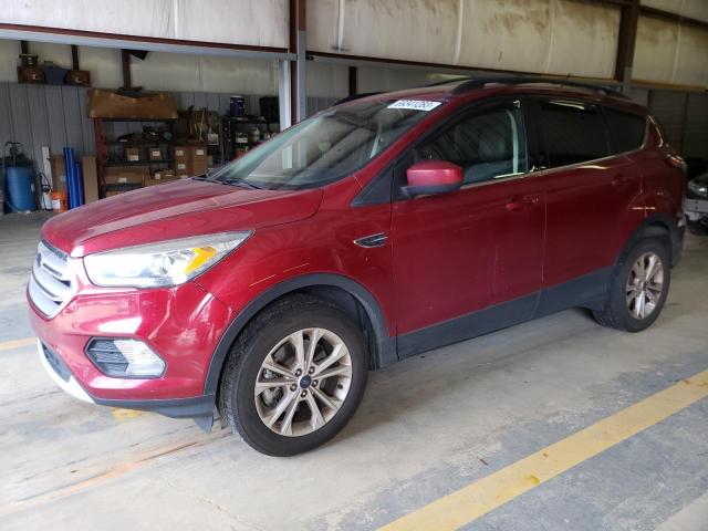 FORD ESCAPE SEL 2018 with VIN 1FMCU9HDXJUB27051 - Photo from auction