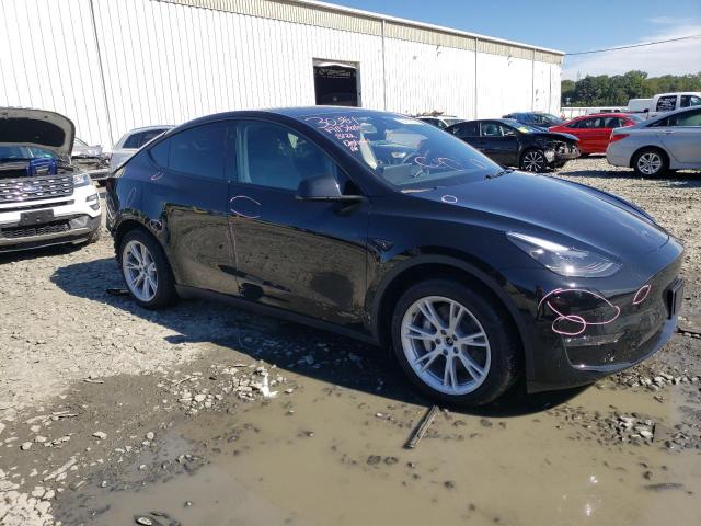Photo 4 from auction – 2023 TESLA MODEL Y with VIN 7SAYGAEE0PF804614