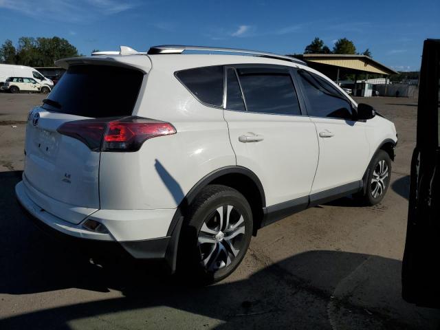 Photo 3 from auction – 2016 TOYOTA RAV4 LE with VIN JTMBFREV4GJ078057