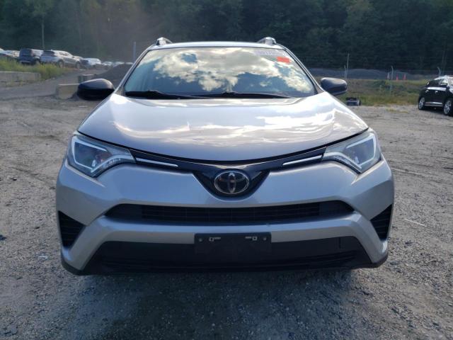 Photo 5 from auction – 2018 TOYOTA RAV4 LE with VIN 2T3BFREV0JW729547