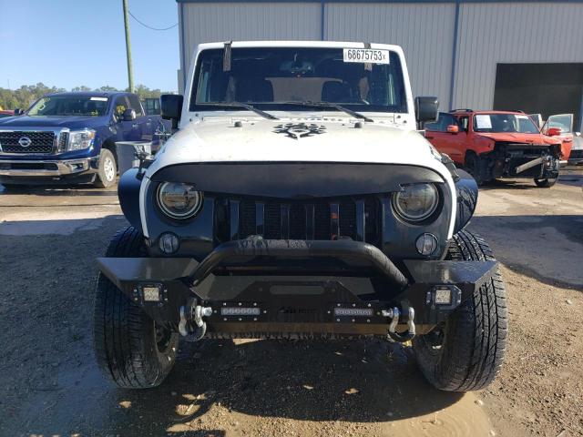 Photo 5 from auction – 2016 JEEP WRANGLER U with VIN 1C4BJWDG1GL244510