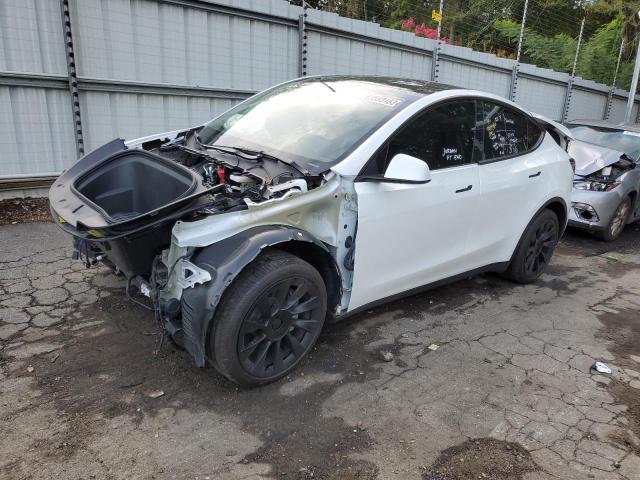 TESLA MODEL Y 2022 with VIN 7SAYGDEE9NA016636 - Photo from auction