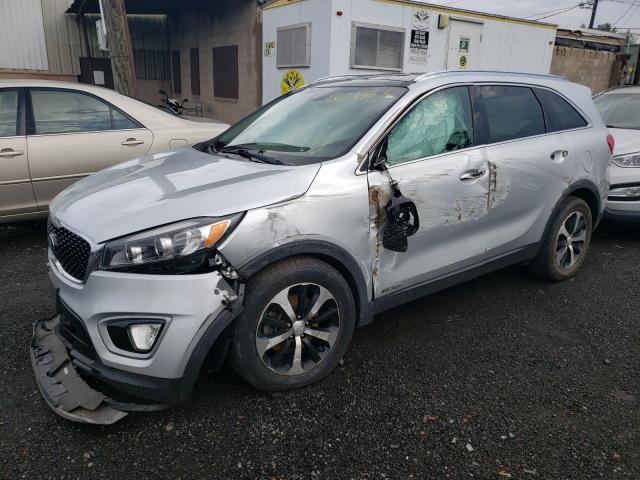 KIA SORENTO EX 2016 with VIN 5XYPHDA53GG129850 - Photo from auction