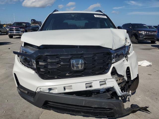 Photo 5 from auction – 2023 HONDA PASSPORT E with VIN 5FNYF8H01PB000346