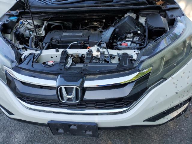Photo 12 from auction – 2015 HONDA CR-V LX with VIN 5J6RM4H39FL021481