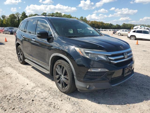 Photo 4 from auction – 2016 HONDA PILOT ELIT with VIN 5FNYF6H09GB104765