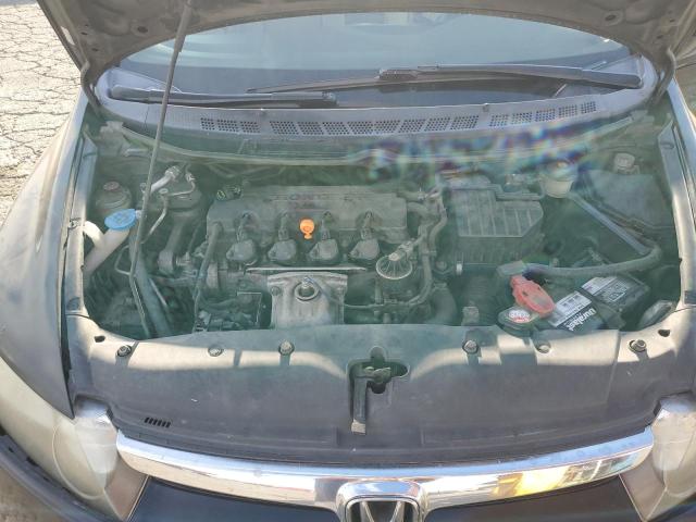Photo 11 from auction – 2006 HONDA CIVIC LX with VIN JHMFA15586S003466