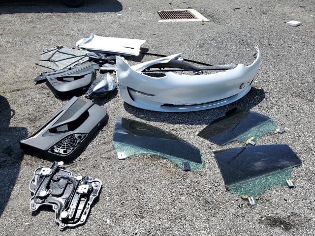 Photo 12 from auction – 2021 TESLA MODEL 3 with VIN 5YJ3E1EA3MF989098