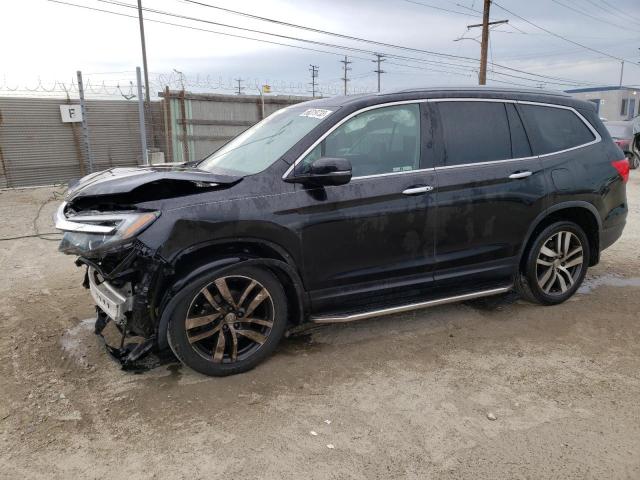 HONDA PILOT ELIT 2018 with VIN 5FNYF6H04JB000367 - Photo from auction
