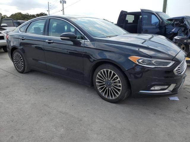 Photo 4 from auction – 2018 FORD FUSION TIT with VIN 3FA6P0D99JR168774