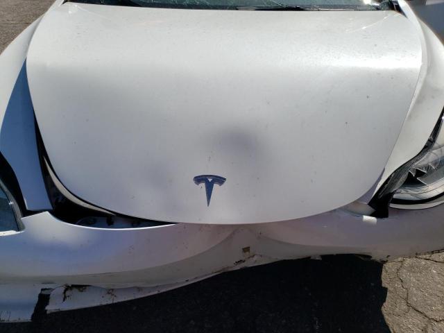 Photo 11 from auction – 2022 TESLA MODEL 3 with VIN 5YJ3E1EA9NF143236