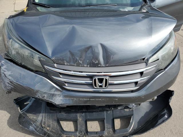 Photo 11 from auction – 2014 HONDA CR-V LX with VIN 5J6RM4H34EL038428