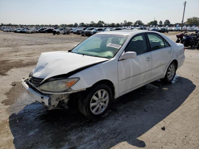 TOYOTA CAMRY LE 2002 with VIN JTDBF30K320005075 - Photo from auction